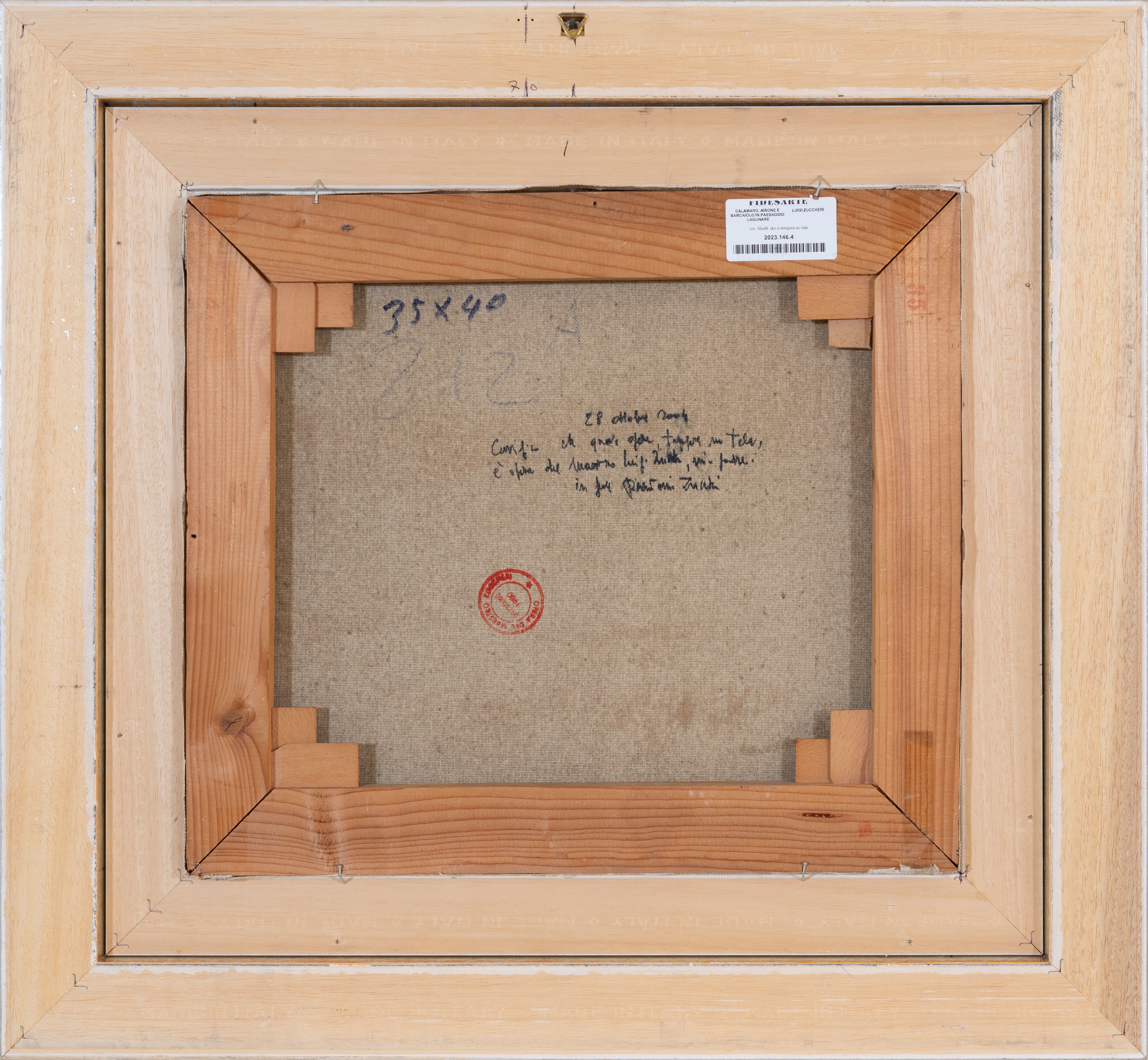 Calamaro, airone e barcaiolo in paesaggio lagunare